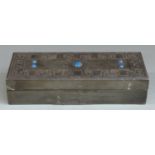 Arts and Crafts pewter box in the manner of Archibald Knox set with five blue cabochons, length