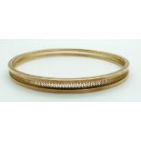 A 9ct gold flapper bangle, Chester 1911, 10.1g