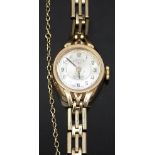 Rotary 9ct gold ladies wristwatch with black hands and Arabic numerals, two-tone silver and cream