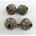 Pair of cufflinks set with green stones, marked 800 and with maker's mark possibly AG