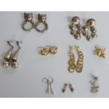 Three pairs of silver gilt earrings including, pair silver earrings set with cubic zirconia, and a