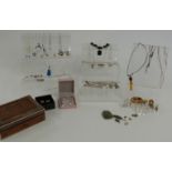 A collection of silver jewellery including pendants, bracelets, earrings, glass beads, etc