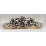 An 18ct gold ring set with three diamonds in a platinum setting, 3.1g, size M