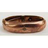 Victorian 9ct rose gold scarf clip set with a diamond in a star