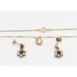 A 9ct gold necklace set with cubic zirconia and a pair of 9ct gold earrings, 2.6g