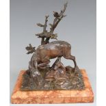 Late 19th or early 20thC bronze figure of a deer and fawn beneath a tree, raised on a bevelled