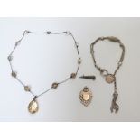 A silver necklace set with quartz, silver fob, white metal chatelaine etc