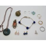 A carved lapis lazuli bracelet, glass pendant, agate necklace, 9ct gold ring set with diamonds (1.