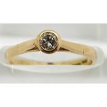 An 18ct gold ring set with a diamond of approximately 0.1ct, 2.2g, size L