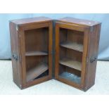19thC mahogany campaign bookcase with brass protective fittings and steel handles, opening to reveal