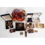 A collection of costume jewellery including filigree brooch, beads, thimble in case, brooches etc