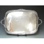 Large hallmarked silver twin handled tray with gadrooned edge, engraved 'presented to Anders