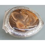 18th century agate and cowrie shell silver mounted snuff box, the unmarked silver mounts having gilt