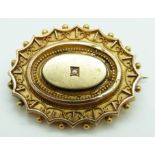 Victorian Etruscan Revival gold brooch set with a seed pearl, 5.4g, 2.5 x 3.4cm