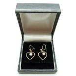 Pair of bespoke 9ct gold earrings each set with a diamond of approximately 0.4ct  in a heart