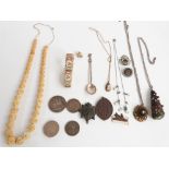 A collection of costume jewellery including enamel brooch, silver spoon, rolled gold necklace,