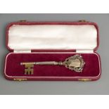 Cased hallmarked silver gilt commemorative key, dated 1972 to commemorate the opening of Cartref