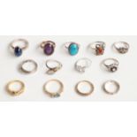 Twelve various silver rings including cabochon examples and a further plated ring