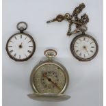 Three pocket watches comprising two silver examples, one on hallmarked silver chain with T-bar and a