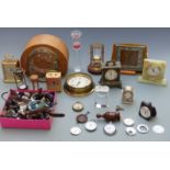 A collection of clocks, watches and parts for the restorer