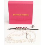 Butler & Wilson jewellery including a bracelet made up of skull links, a Butler & Wilson pearl and