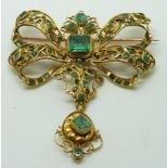 19thC pendant/ brooch set with emerald cut, pear cut and triangular cut emeralds, possibly