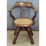 Vintage oak bergere office/swivel chair