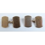 A pair of 9ct gold cufflinks with engine turned decoration, 7.8g