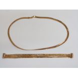 A 9ct gold necklace, 20.5cm drop and 9ct gold bracelet, 16.2g