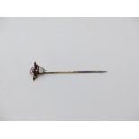 Victorian stick pin in the form of a fly set with an oval opal cabochon, sapphire, cabochon eyes and