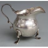 Edward VIII silver jug raised on three feet, Chester 1907 maker George Nathan & Ridley Hayes, height