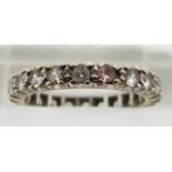 A 9ct gold eternity ring set with synthetic spinel, 2.7g, size K