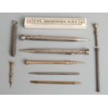 Nine propelling and other pencils and tools to include Mordan, yellow metal Victorian example with