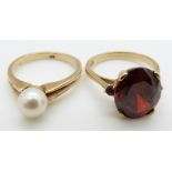 Two 9ct gold rings, one set with pearls and the other a garnet, 8.9g