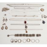 A collection of silver jewellery including a large curb link necklace, 9ct gold and silver ring,