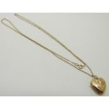 A 9ct gold heart locket and chain, 2.3g