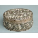 A white metal Thai / Nepalese lidded pot with embossed deities, width 9cm, weight 93g