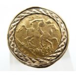 A 1914 gold half sovereign set into a 9ct gold ring, 8.5g, size M