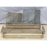 Four brass fireplace fenders or kerbs etc