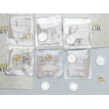 Ten various commemorative miniature gold coins, each weighing 0.5g, some 375 and some 585