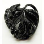 Victorian carved jet brooch in the form of a grape vine, 6 x 6cm