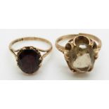 Two 9ct gold rings, one set with an oval cut garnet and another set with citrine, 5g