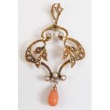 Art Nouveau 9ct gold pendant set with seed pearls and a tear drop coral bead, 5cm long
