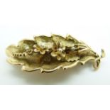 Victorian brooch/ pendant set with seed pearls in a textured floral and leaf design, 4.8g, 5 x 2cm