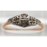 A 9ct gold ring set with diamonds in a platinum setting, 1.8g, size O