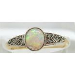 Art Deco 18ct gold ring set with an oval opal cabochon and diamonds, 2.1g, size J