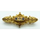 Edwardian 15ct gold brooch set with a diamond and sapphires with sphere and foliate design,
