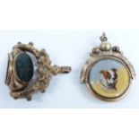 Two Victorian swivel fobs set with agate and one depicting a dog