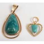 A 14k gold pendant set with turquoise (3.8g) and an 18ct gold pendant (1g)