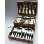 Eight place setting canteen of cutlery in oak case with drawer